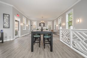 Gahanna apartment for rent - A dining room with a wooden table and chairs.