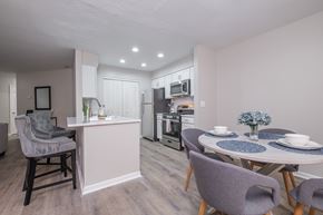 Gahanna apartment for rent - A kitchen with a dining table and chairs.
