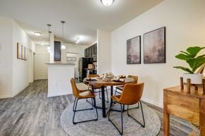 Smyrna apartment for rent - A dining room with a table set for two and a plant on the side table.