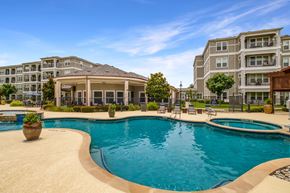 Wylie apartment for rent - A large swimming pool in front of apartment buildings.