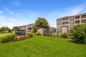 Wylie apartment for rent - A sign that says Retreat is in front of a building.