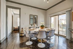 San Antonio apartment for rent - A dining room with a table set for six.