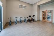 San Antonio apartment for rent - A room with exercise bikes lined up against the wall.