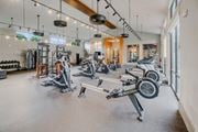 San Antonio apartment for rent - A gym with a variety of equipment including treadmills and weights.
