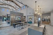 San Antonio apartment for rent - A modern interior space with a large table and chairs.