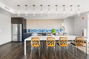 Walnut Creek apartment for rent - A modern kitchen with a dining table and chairs.