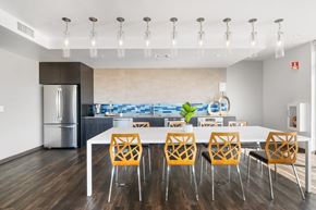Walnut Creek apartment for rent - A modern kitchen with a dining table and chairs.