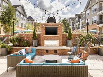 Fire pit and fireplace lounge with tvs