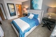 Dublin apartment for rent - A bedroom with a large bed and a painting on the wall.
