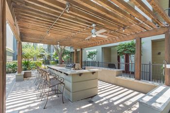 Outdoor grill with intimate seating area