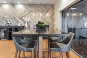 Columbus apartment for rent - A modern dining room with a large table and chairs.