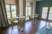 Grove City apartment for rent - A dining room with a table and chairs.