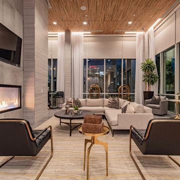 Dallas apartment for rent - a living room with a couch and a table