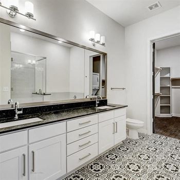 Tile floors and walls in bathroom