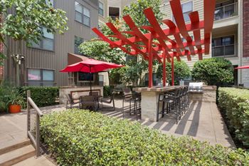 Outdoor grill with intimate seating area