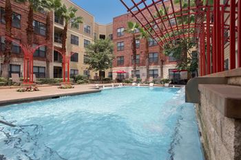 Two resort inspired swimming pools with sundeck
