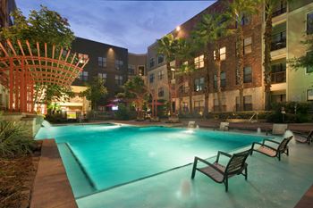 Two resort inspired swimming pools with sundeck