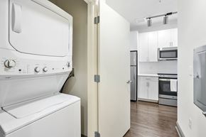 Washington Dc apartment for rent - A white oven and microwave in a kitchen.