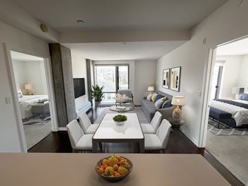 San Francisco apartment for rent - A modern living room with a dining table and chairs.
