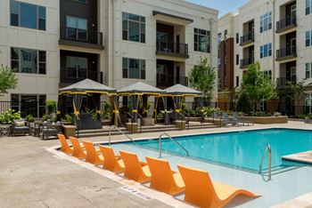 Swimming pool with relaxing sundecks