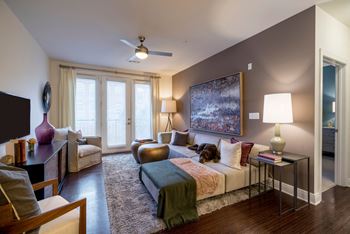 Beautiful bright bedroom with wide windows