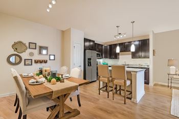 Kitchens with islands, custom tile backsplash, and granite countertops