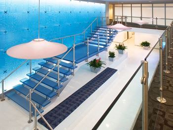 Atrium with quiet seating alcoves and 400-gallon salt water reef aquarium