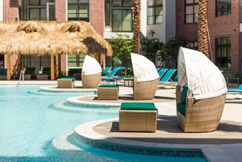 Resort-inspired pool with cabanas