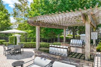 Outdoor kitchen & grilling area with al fresco dining