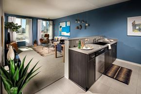Los Angeles apartment for rent - A kitchen with a sink and a fridge.
