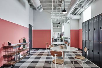 Resident laundry center with lockers