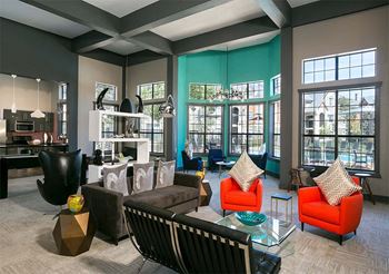 Resident lounge with comfortable seating and conversation areas