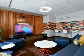 Adjacent skye lounge with flat screen tv, wifi and casual couches
