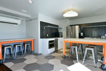 Gourmet community kitchen with epicurean tables