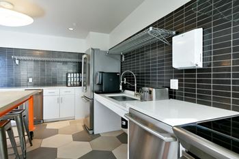 Gourmet community kitchen with epicurean tables