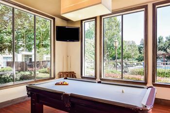 Game room with billiards table