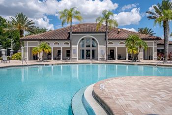 Resort-style swimming pool with sundeck