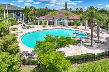Resort-style swimming pool with sundeck