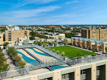 Roof deck with lush gardens, gas grills and 360-degree dc views