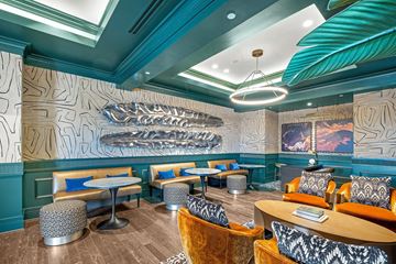 Houston apartment for rent - A restaurant interior with a large fish sculpture on the wall.