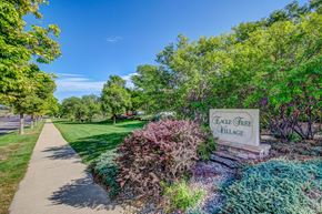 Fort Collins apartment for rent - a park with a sidewalk and a sign that reads beach area alliance