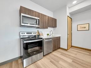 Des Moines apartment for rent - a kitchen with stainless steel appliances and a microwave