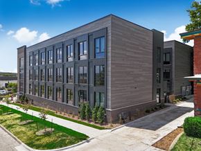Des Moines apartment for rent - a large building with a sidewalk in front of it