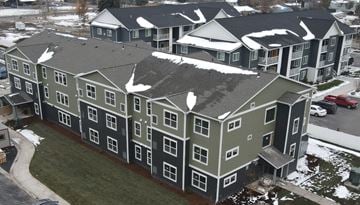 Kalispell apartment for rent - an aerial view of an apartment building in the snow