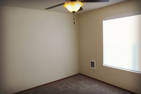 Evanston apartment for rent - Space with window, fan, and wall heater