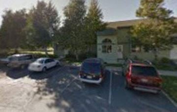 Hailey apartment for rent - a blurry image of cars parked in a parking lot