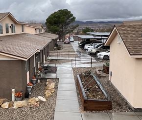 St. George apartment for rent - view of property showing units and raised garden beds