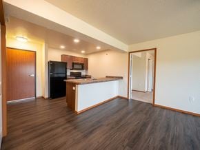 Casper apartment for rent - Image counter space, refrigerator, stove, microwave, sink, and cabinets