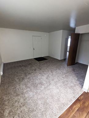 Seaside apartment for rent - Image of living room looking out from kitchen.