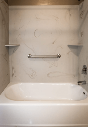 Nampa apartment for rent - a white bathtub in a bathroom with grab bars